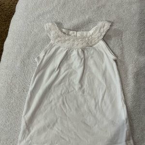 White sleeveless toddler shirt